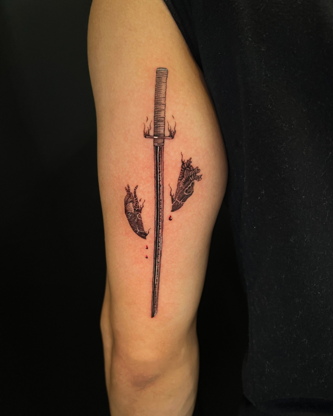 Black and grey owl with a skull and clock on the forearm